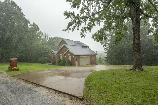 287 Appletree Dr, Ozark, MO 65721 - traditional home with driveway, a front lawn, and brick siding