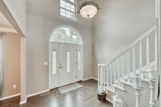 287 Appletree Dr, Ozark, MO 65721 - foyer with a towering ceiling, wood finished floors, baseboards, a chandelier, and stairway