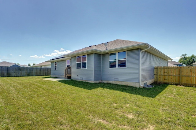 511 Mark St, Billings, MO 65610 - rear view of house featuring a fenced backyard and roof with shingles