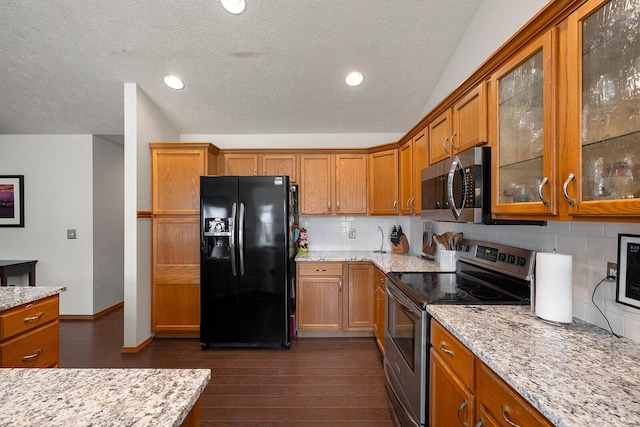 5204 W Turnberry Ct, Ozark, MO 65721 - kitchen with stainless steel appliances, brown cabinetry, dark wood finished floors, a textured ceiling, and recessed lighting