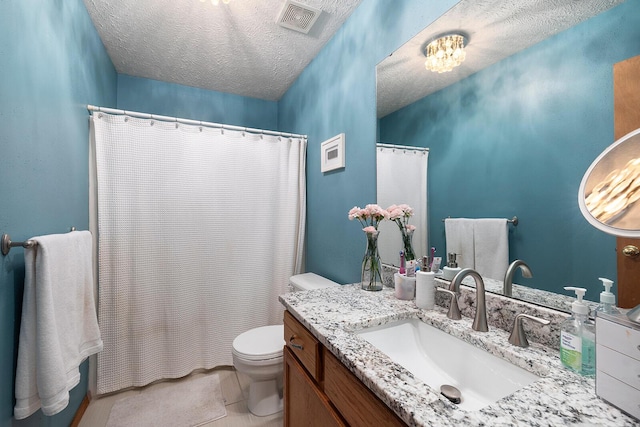 5204 W Turnberry Ct, Ozark, MO 65721 - full bath featuring toilet, vanity, a textured ceiling, a shower with shower curtain, and tile patterned flooring