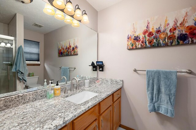 5204 W Turnberry Ct, Ozark, MO 65721 - full bathroom featuring vanity, toilet, and a stall shower