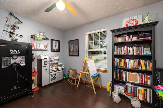 5204 W Turnberry Ct, Ozark, MO 65721 - rec room featuring dark wood-style floors, a ceiling fan, a textured ceiling, and baseboards