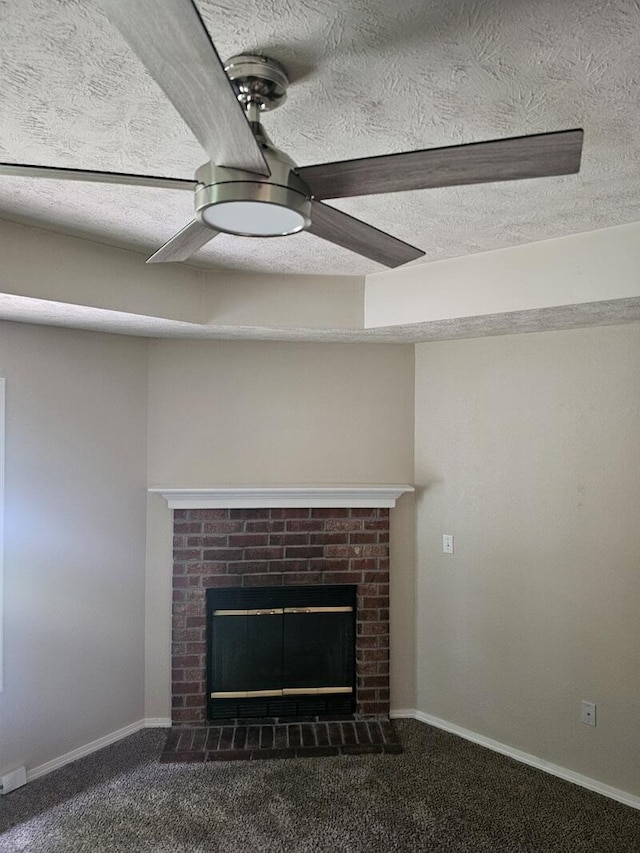 3807 S Leawood Ave, Springfield, MO 65807 - detailed view of carpet floors, a fireplace, ceiling fan, a textured ceiling, and baseboards
