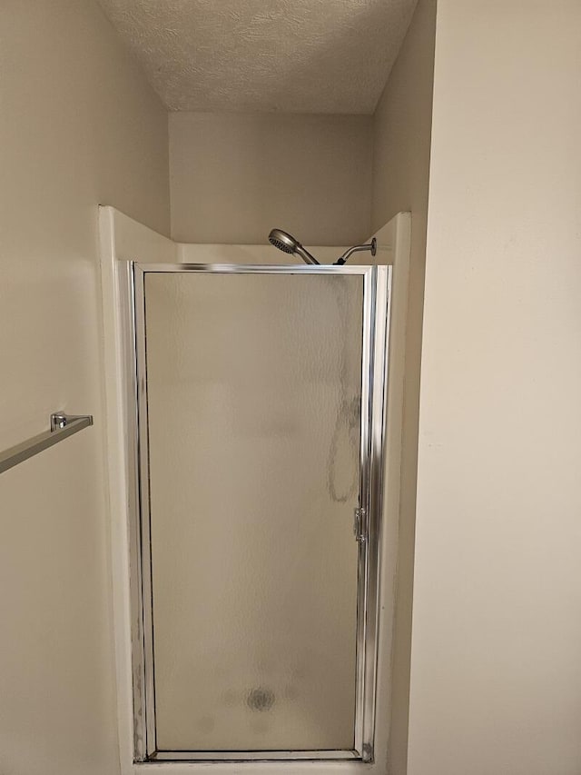 3807 S Leawood Ave, Springfield, MO 65807 - full bath with a stall shower and a textured ceiling
