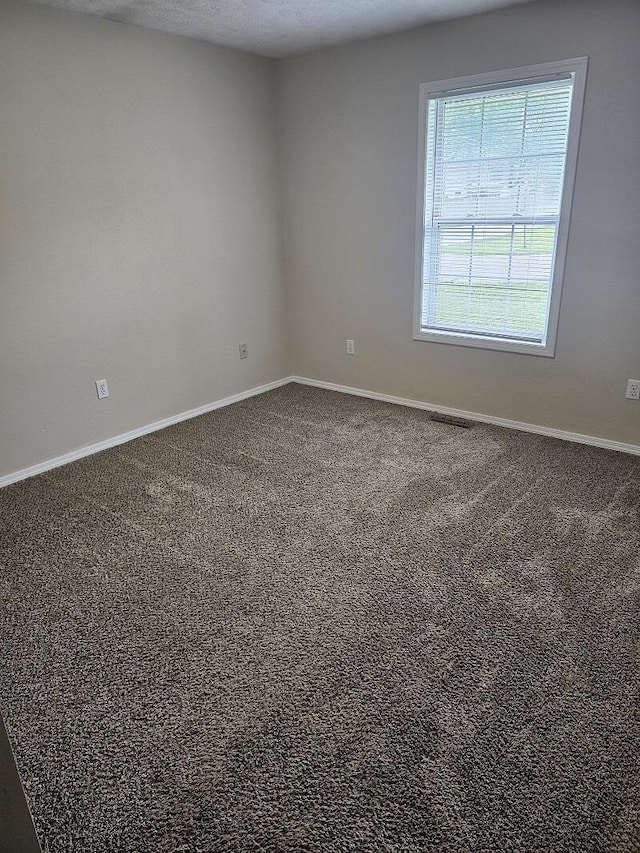 3807 S Leawood Ave, Springfield, MO 65807 - empty room with carpet floors and baseboards