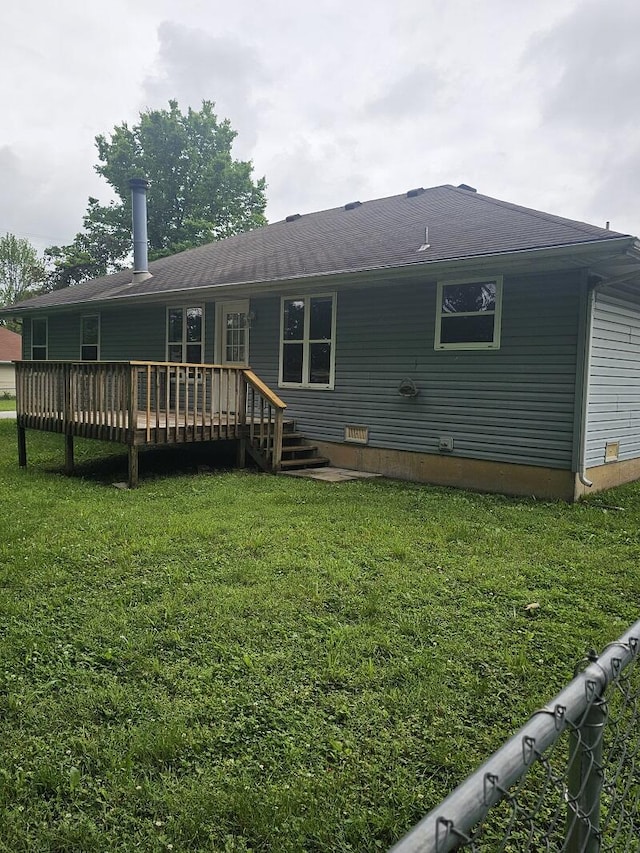 3807 S Leawood Ave, Springfield, MO 65807 - rear view of property with a lawn and a wooden deck