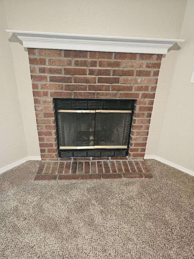 3807 S Leawood Ave, Springfield, MO 65807 - detailed view of a fireplace, carpet flooring, and baseboards