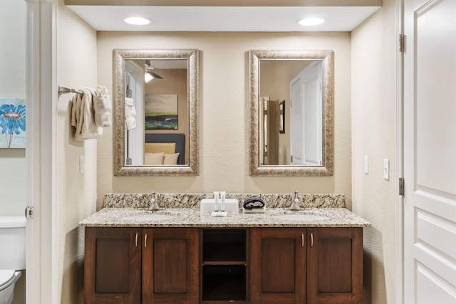 2800 Green Mountain Dr Unit 230, Branson, MO 65616 - bathroom featuring toilet and double vanity