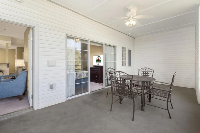 2800 Green Mountain Dr Unit 230, Branson, MO 65616 - sunroom featuring a ceiling fan and outdoor dining space