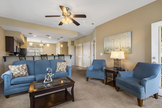 2800 Green Mountain Dr Unit 230, Branson, MO 65616 - living area with ceiling fan and light carpet