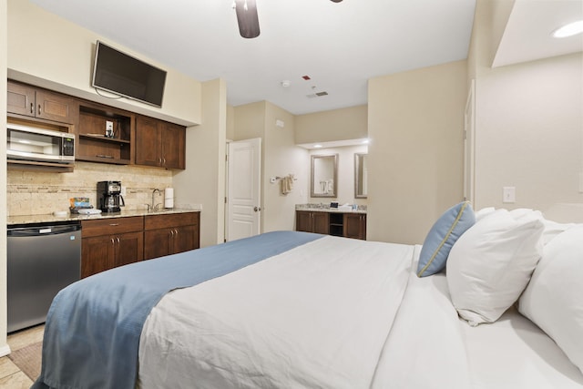 2800 Green Mountain Dr Unit 230, Branson, MO 65616 - bedroom featuring a sink and connected bathroom