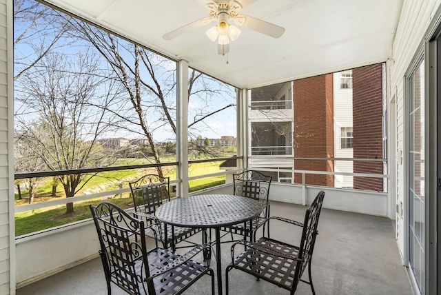2800 Green Mountain Dr Unit 230, Branson, MO 65616 - sunroom with a ceiling fan and outdoor dining space