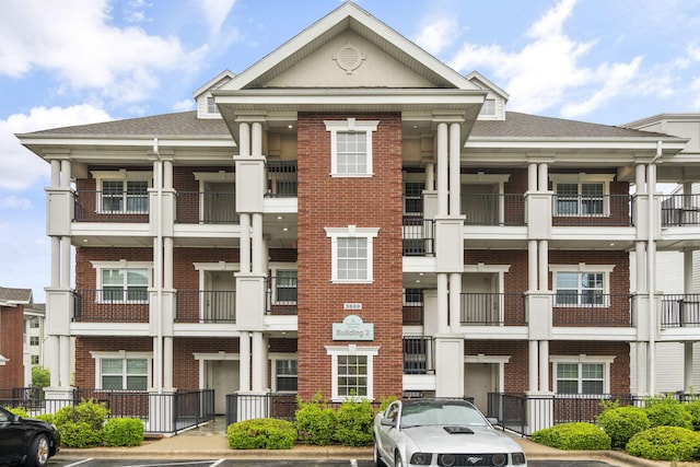 2800 Green Mountain Dr Unit 230, Branson, MO 65616 - view of building exterior with uncovered parking