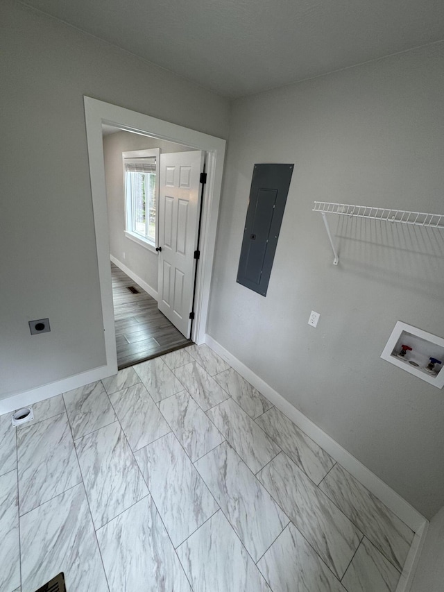 108 Jasper St, Aurora, MO 65605 - laundry area with electric panel, washer hookup, baseboards, marble look tiles, and hookup for an electric dryer