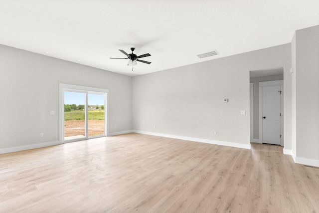 1312 N Maxine Ave, Nixa, MO 65714 - unfurnished room with ceiling fan, light wood-style floors, and baseboards