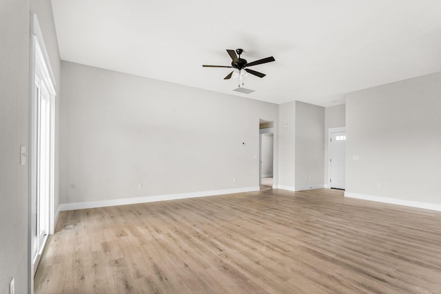 1312 N Maxine Ave, Nixa, MO 65714 - unfurnished room with a ceiling fan, light wood finished floors, and baseboards