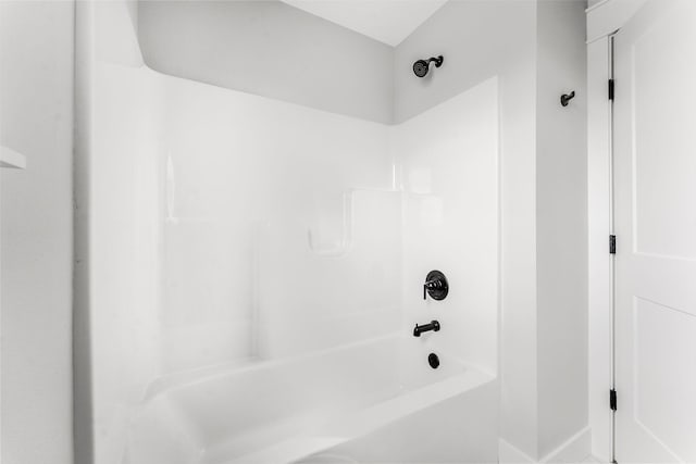 1312 N Maxine Ave, Nixa, MO 65714 - full bathroom featuring bathing tub / shower combination and baseboards