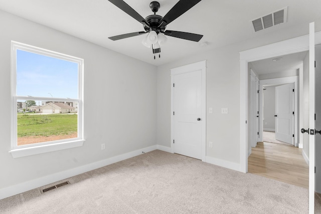 1312 N Maxine Ave, Nixa, MO 65714 - unfurnished bedroom with light carpet and baseboards