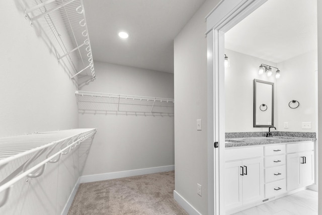 1312 N Maxine Ave, Nixa, MO 65714 - spacious closet with a sink and light carpet