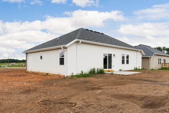 1312 N Maxine Ave, Nixa, MO 65714 - rear view of property with a shingled roof