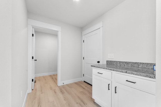 1312 N Maxine Ave, Nixa, MO 65714 - bathroom with wood finished floors, baseboards, and vanity