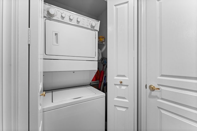 351 S Wildwood Dr Unit 5, Branson, MO 65616 - laundry area with stacked washer / dryer