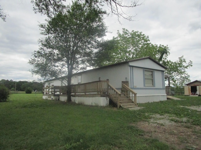 9065 County Road 3940, Mountain View, MO 65548 - rear view of property with a deck and a yard