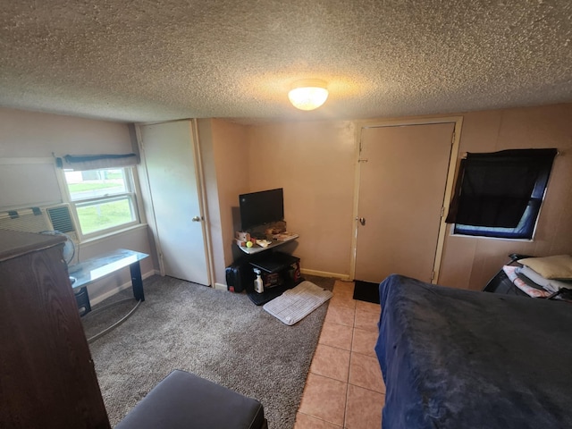 626 W N St, Mountain Grove, MO 65711 - bedroom featuring a textured ceiling and light tile patterned flooring