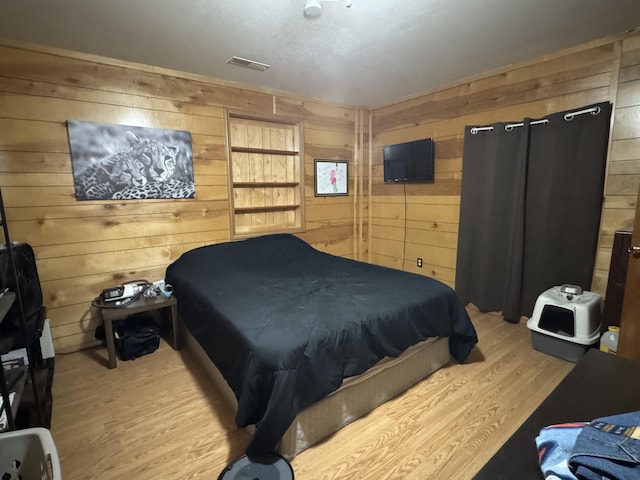 11513 Co Rd Unit 76-203, Ava, MO 65608 - bedroom featuring wood walls and wood finished floors
