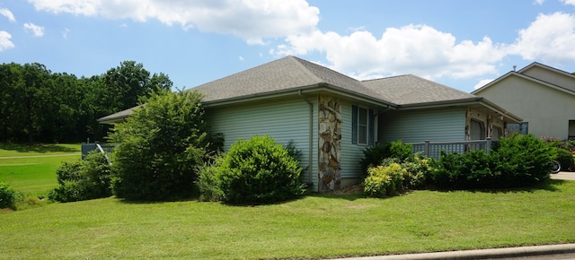 159 Buckingham Dr, Branson, MO 65616 - view of side of home with a lawn and a shingled roof
