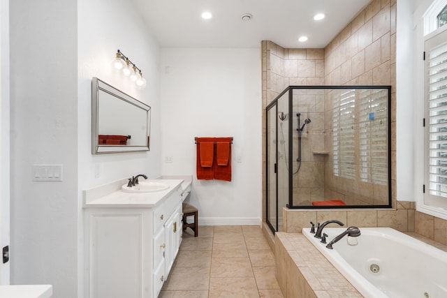 185 Appaloosa Trl, Saddlebrooke, MO 65630 - bathroom featuring a jetted tub, a shower stall, vanity, healthy amount of natural light, and recessed lighting