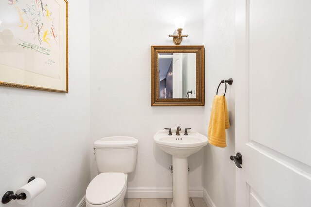 185 Appaloosa Trl, Saddlebrooke, MO 65630 - half bath featuring toilet, tile patterned floors, and baseboards