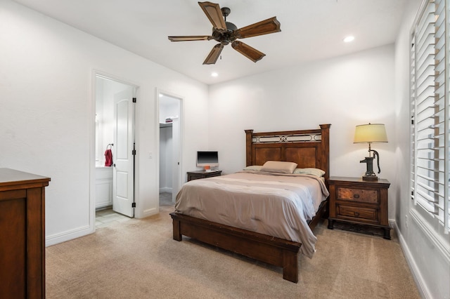 185 Appaloosa Trl, Saddlebrooke, MO 65630 - bedroom featuring light colored carpet, recessed lighting, ensuite bathroom, baseboards, and ceiling fan