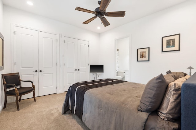 185 Appaloosa Trl, Saddlebrooke, MO 65630 - bedroom with two closets, light colored carpet, recessed lighting, connected bathroom, and ceiling fan