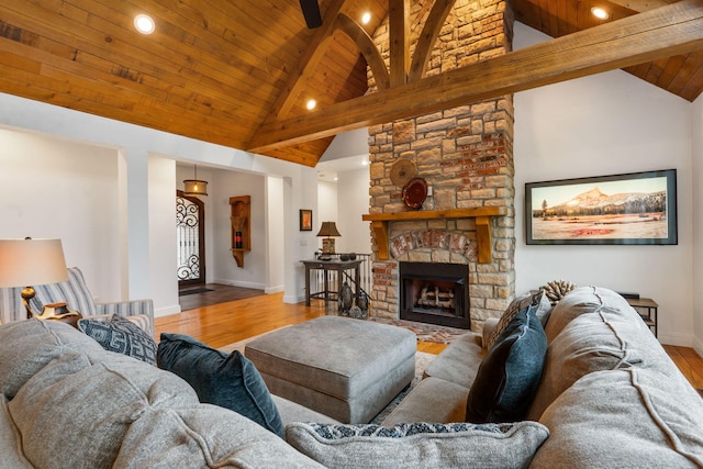 185 Appaloosa Trl, Saddlebrooke, MO 65630 - living area with high vaulted ceiling, wood finished floors, baseboards, recessed lighting, and a fireplace