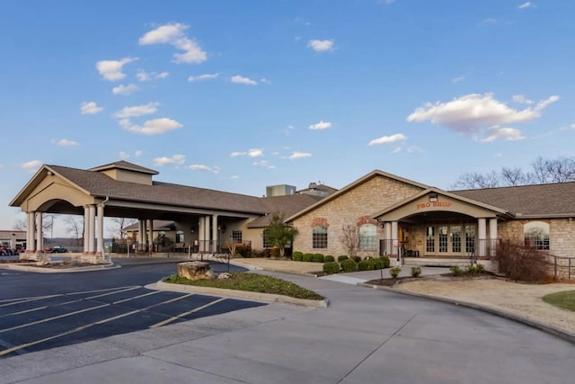 123 Bunker Ridge Dr Unit 4, Branson, MO 65616 - view of building exterior with uncovered parking