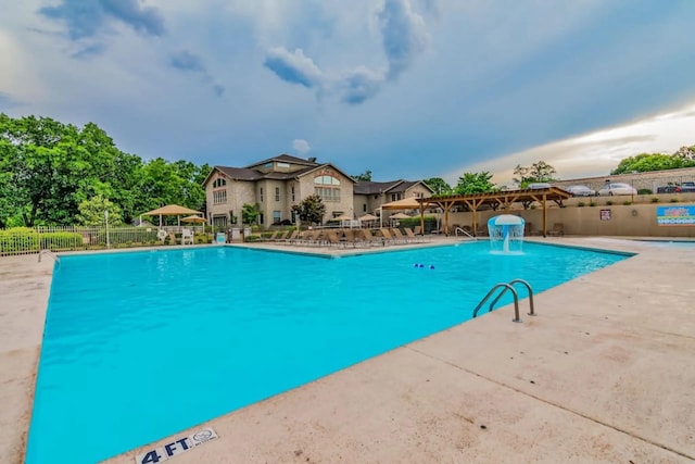 123 Bunker Ridge Dr Unit 4, Branson, MO 65616 - community pool featuring a patio area