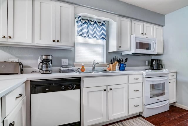 123 Bunker Ridge Dr Unit 4, Branson, MO 65616 - kitchen with white appliances and white cabinetry