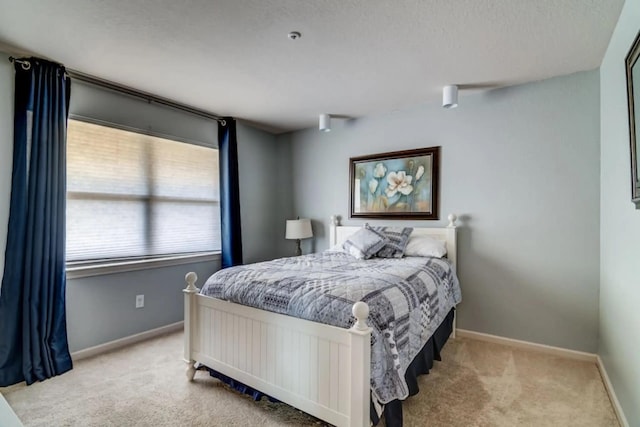 123 Bunker Ridge Dr Unit 4, Branson, MO 65616 - bedroom with carpet and baseboards