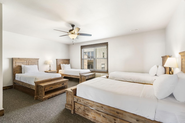 bedroom with carpet floors and a ceiling fan