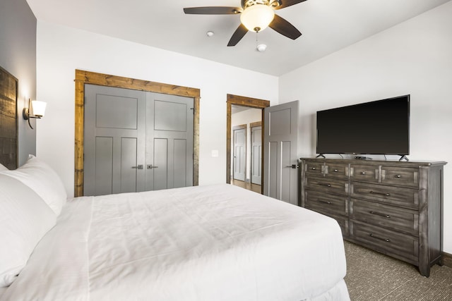 carpeted bedroom featuring a ceiling fan