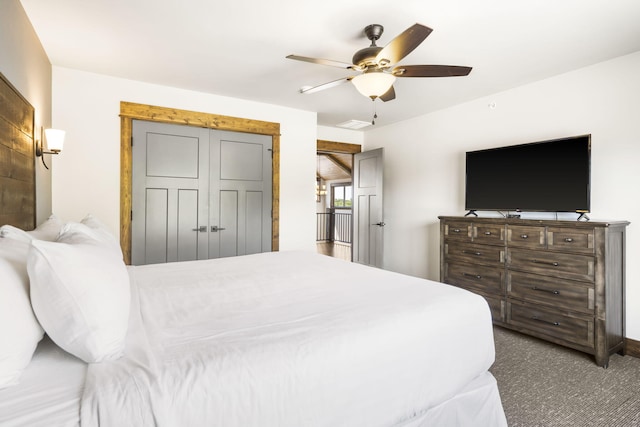 bedroom with a ceiling fan and carpet floors