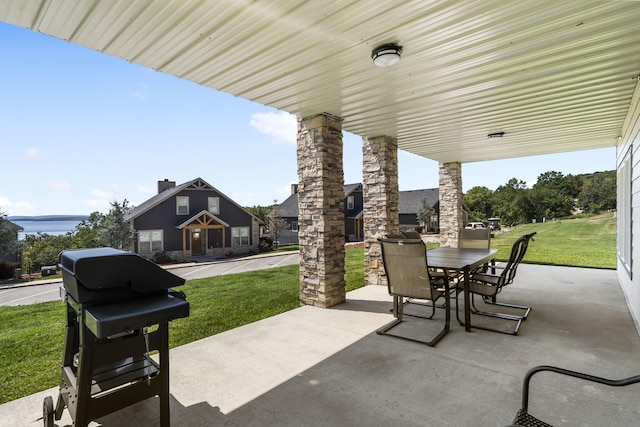 view of patio / terrace featuring outdoor dining area and grilling area