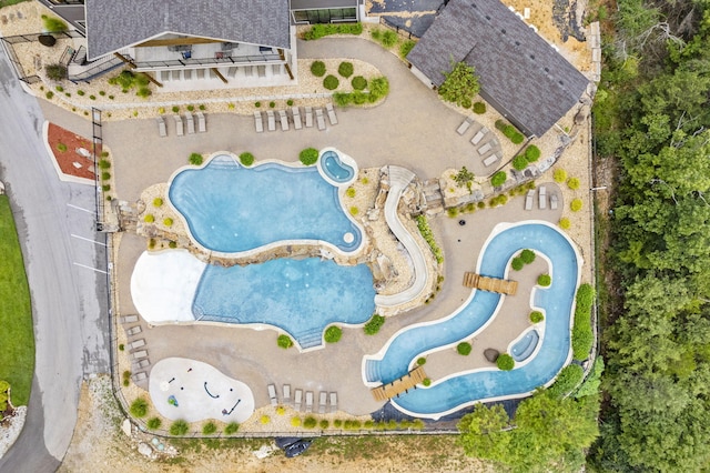 drone / aerial view of a pool area