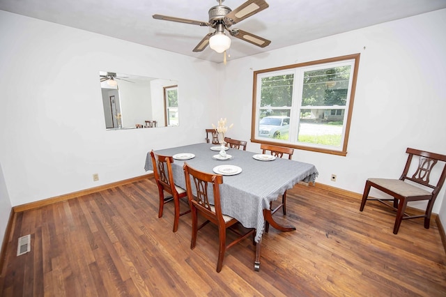 202 E Seminole St, Springfield, MO 65807 - dining room with healthy amount of natural light, wood finished floors, baseboards, and ceiling fan