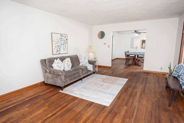 202 E Seminole St, Springfield, MO 65807 - living area featuring baseboards, wood-type flooring, and a ceiling fan