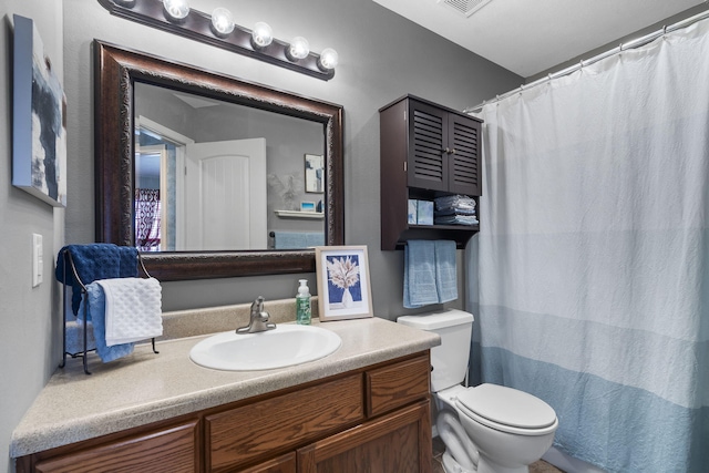 1206 S Solaira St, Ozark, MO 65721 - bathroom featuring vanity and toilet