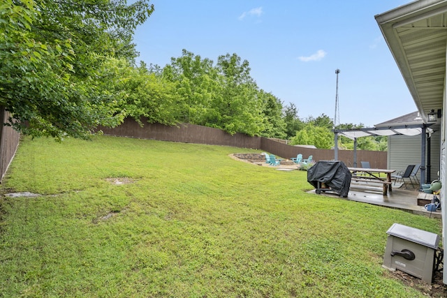 1206 S Solaira St, Ozark, MO 65721 - view of yard with a patio area and an outdoor fire pit