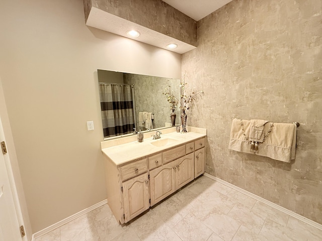 5135 S Clay Ave, Springfield, MO 65810 - full bathroom with vanity, baseboards, and marble finish floors